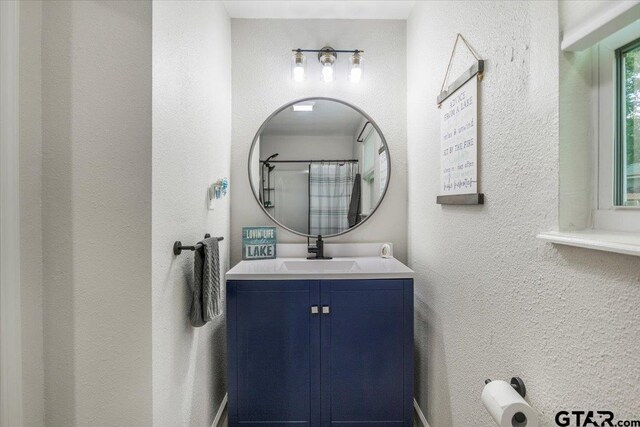 194 Debra Dr, Bullard, TX 75757 - bathroom with vanity and a textured wall