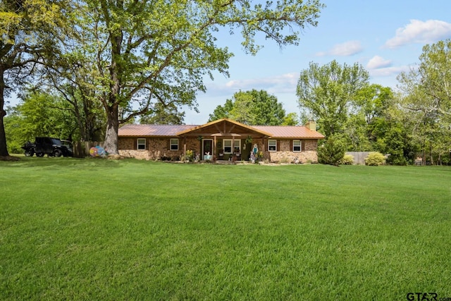 exterior space with a front yard