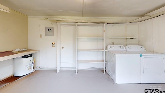 clothes washing area featuring separate washer and dryer