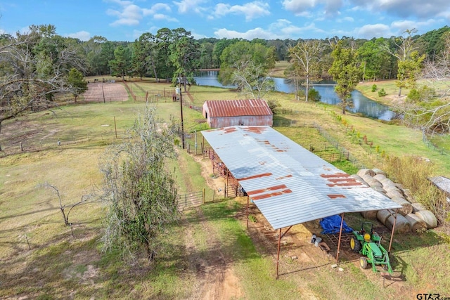 aerial view featuring a rural view and a water view