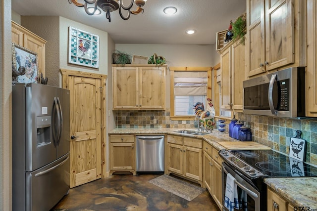 kitchen with appliances with stainless steel finishes, light brown cabinetry, tasteful backsplash, light stone counters, and sink