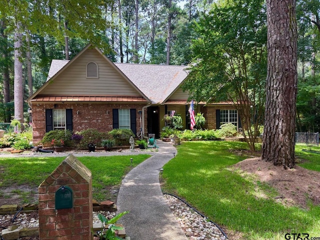 18378 Whipporwill Ln, Flint, TX 75762 - view of front of home with a shingled roof, a front lawn, and brick siding