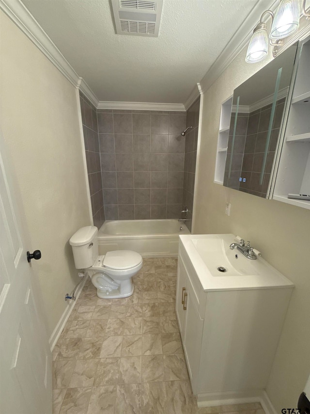 full bathroom with toilet, tiled shower / bath combo, a textured ceiling, ornamental molding, and vanity