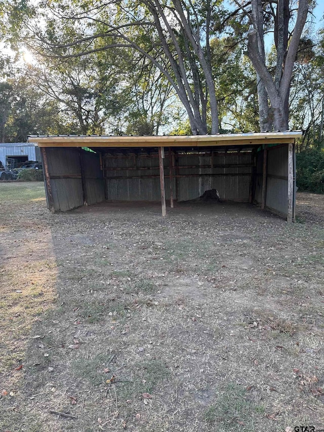 view of outdoor structure with a carport