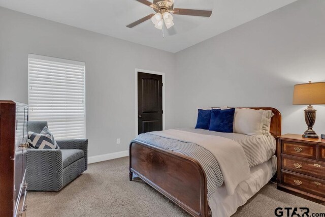 13452 Karah Ln, Lindale, TX 75771 - bedroom featuring carpet, baseboards, and ceiling fan