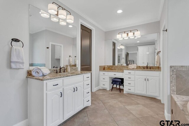 13452 Karah Ln, Lindale, TX 75771 - bathroom with two vanities, ornamental molding, tile patterned floors, recessed lighting, and baseboards