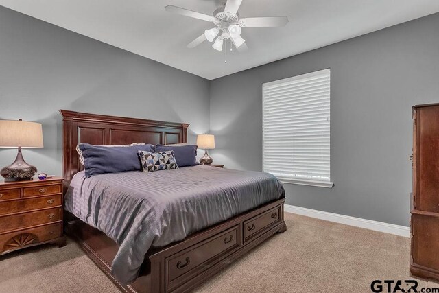 13452 Karah Ln, Lindale, TX 75771 - bedroom with light colored carpet, baseboards, and ceiling fan