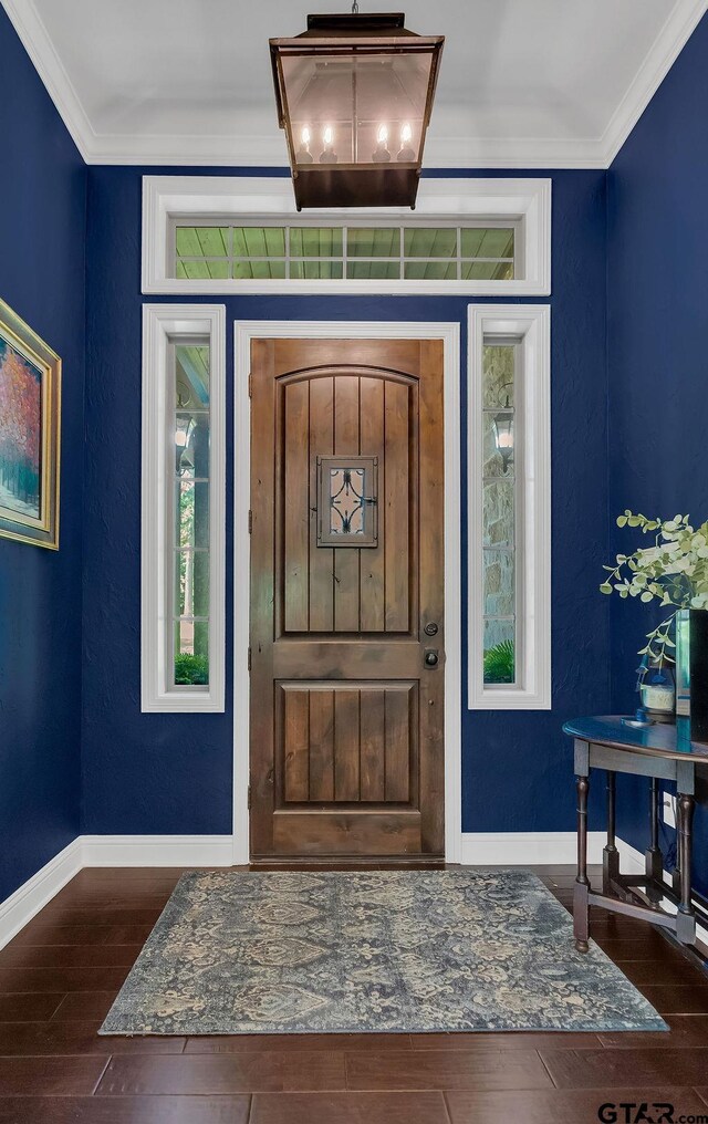 13452 Karah Ln, Lindale, TX 75771 - entrance foyer featuring wood finished floors, crown molding, baseboards, and a chandelier