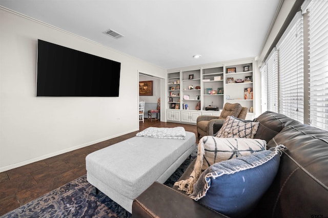 living room featuring dark hardwood / wood-style flooring and built in features