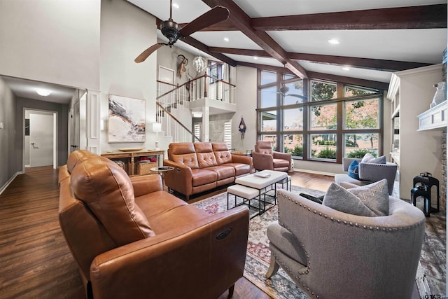 living room featuring dark wood-type flooring, vaulted ceiling with beams, and ceiling fan