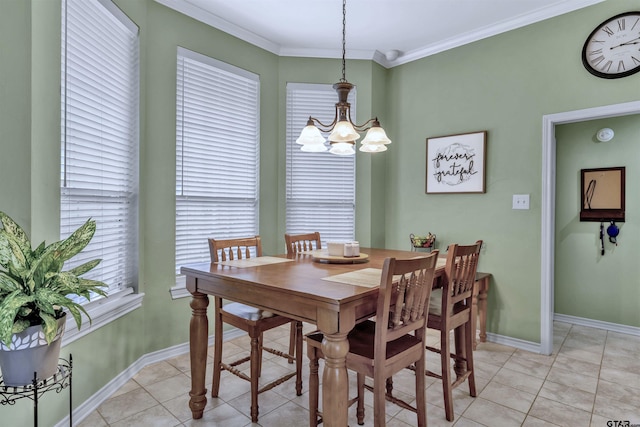 dining room featuring an inviting chandelier, light tile patterned floors, and ornamental molding