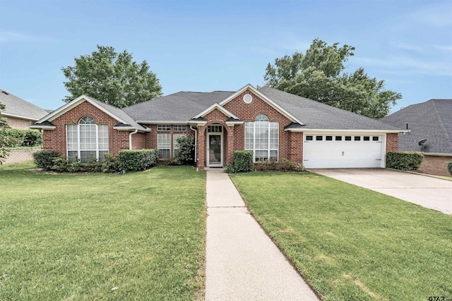 single story home with a garage and a front lawn