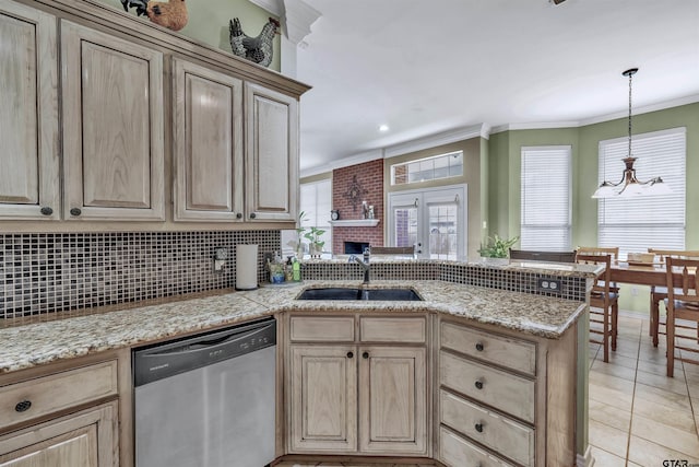 kitchen featuring kitchen peninsula, backsplash, stainless steel dishwasher, ornamental molding, and sink