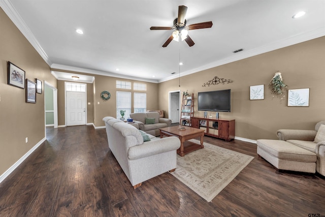 living room with dark hardwood / wood-style floors, ceiling fan, and ornamental molding