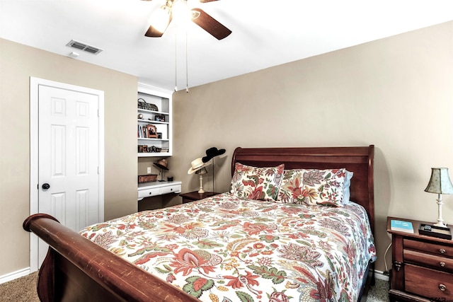 bedroom with dark colored carpet and ceiling fan