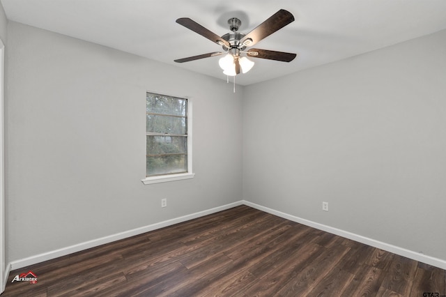 unfurnished room featuring dark wood-type flooring and ceiling fan