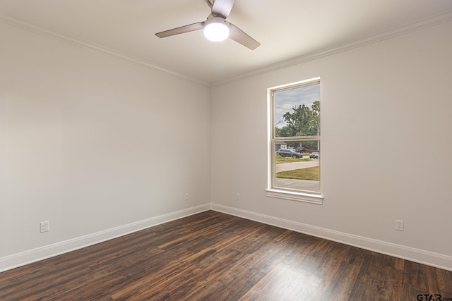 empty room with crown molding, ceiling fan, and dark hardwood / wood-style flooring