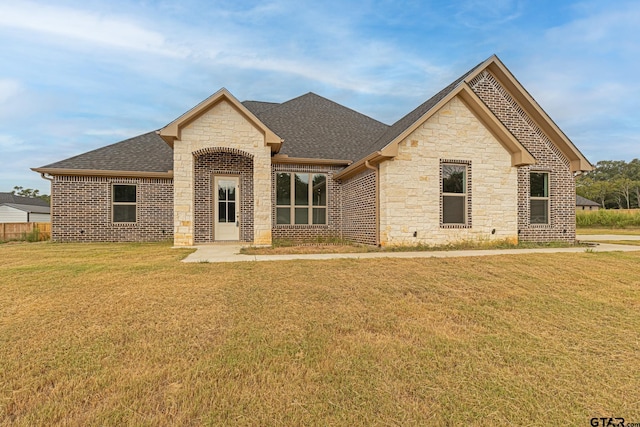 view of front of house with a front yard