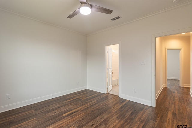 empty room featuring dark wood-type flooring, ceiling fan, and ornamental molding