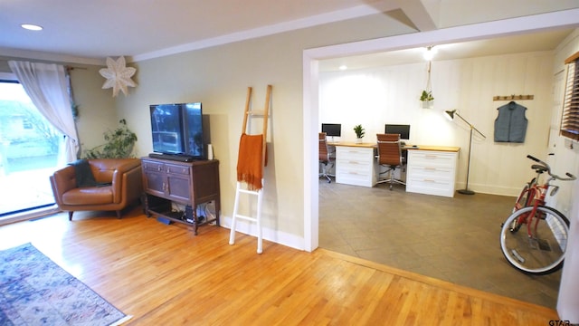 living room with hardwood / wood-style floors and built in desk