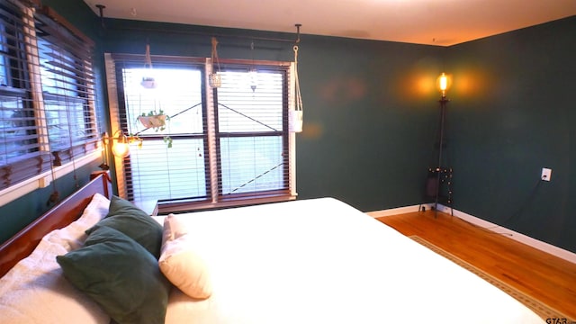 bedroom featuring hardwood / wood-style floors