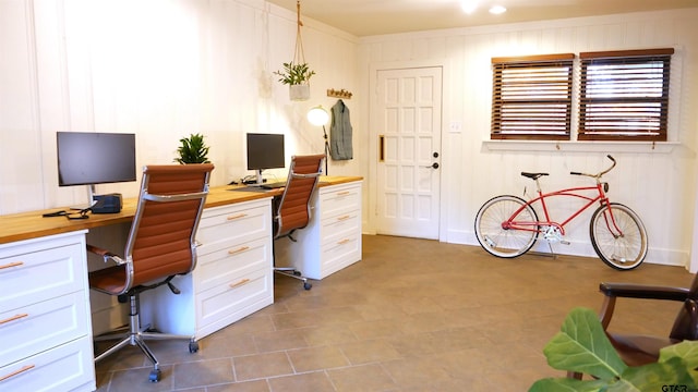 office featuring wood walls