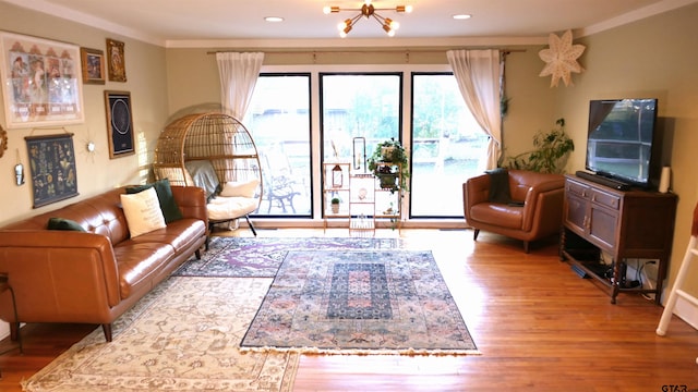 living room featuring a notable chandelier and wood-type flooring