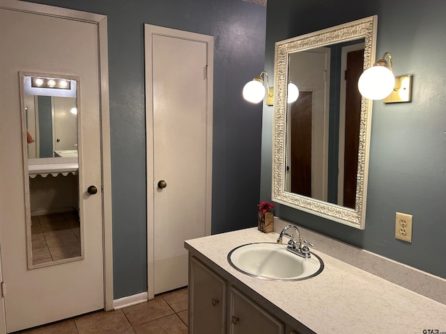 bathroom featuring vanity and tile patterned flooring