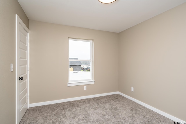 view of carpeted spare room