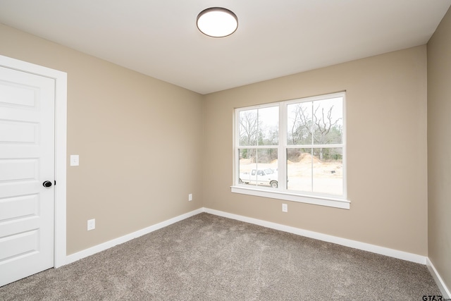 empty room with carpet floors