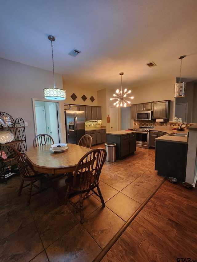 670 Frederick Cir, Flint, TX 75762 - dining area featuring a chandelier and tile patterned floors