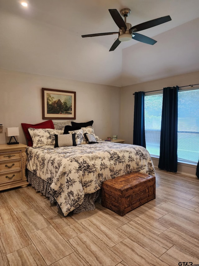 670 Frederick Cir, Flint, TX 75762 - bedroom featuring lofted ceiling, light wood-type flooring, and ceiling fan