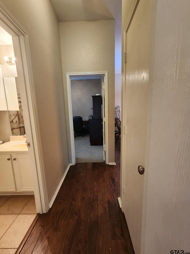 670 Frederick Cir, Flint, TX 75762 - corridor featuring wood finished floors and a sink