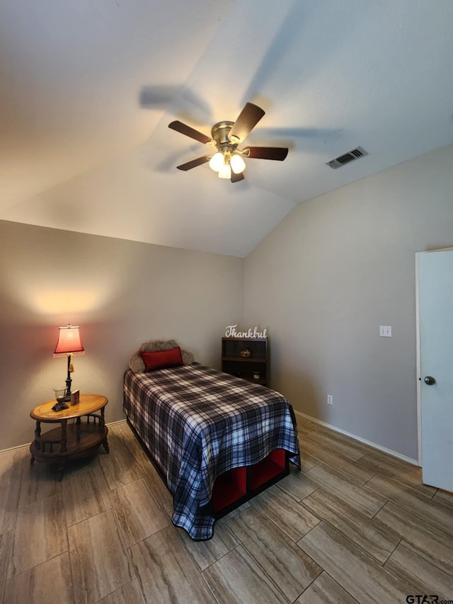 670 Frederick Cir, Flint, TX 75762 - bedroom with wood finish floors, vaulted ceiling, and ceiling fan