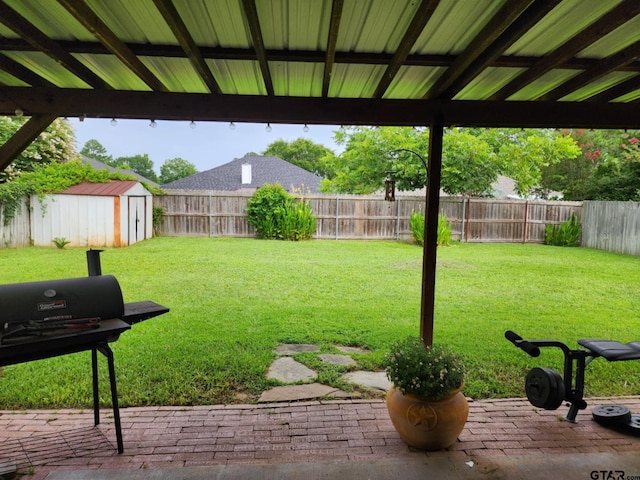 670 Frederick Cir, Flint, TX 75762 - fenced backyard featuring a storage unit and a patio