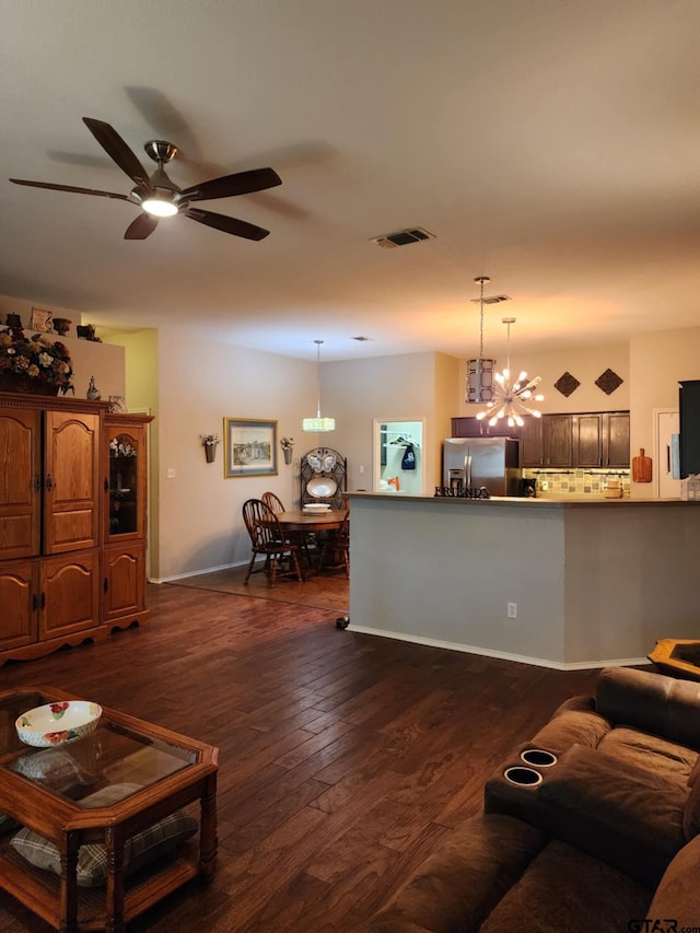670 Frederick Cir, Flint, TX 75762 - living room with ceiling fan, dark wood-type flooring, and a chandelier