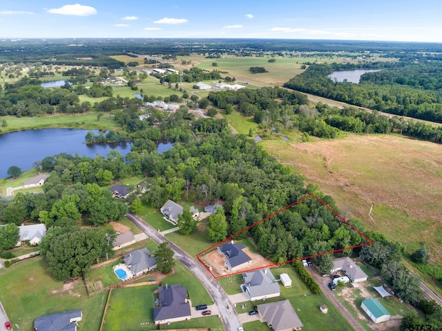 24062 Sun Ridge Rd, Lindale, TX 75771 - aerial view of residential area with a nearby body of water and property boundaries highlighted