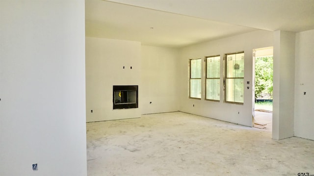 24062 Sun Ridge Rd, Lindale, TX 75771 - unfurnished living room featuring a fireplace