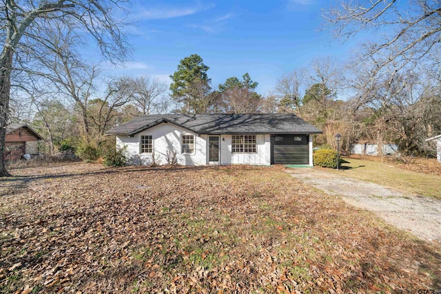 ranch-style house with a front yard