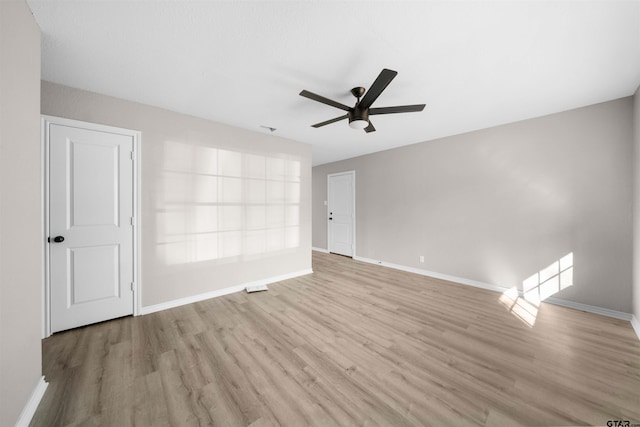 unfurnished room with light hardwood / wood-style floors and ceiling fan