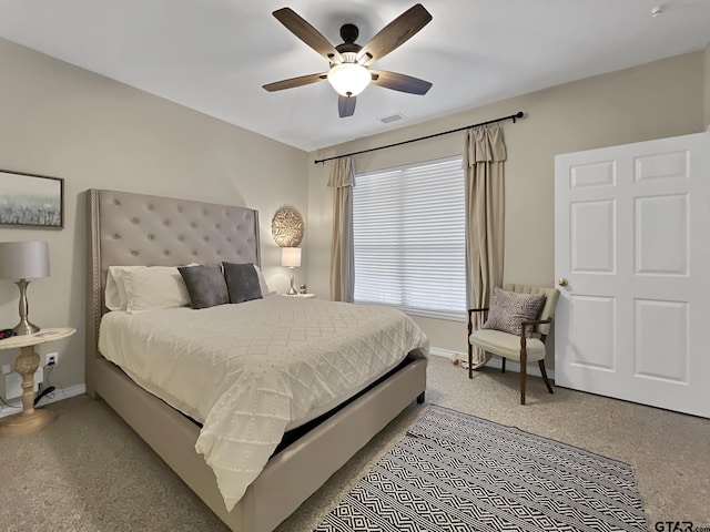 bedroom featuring baseboards, visible vents, and a ceiling fan