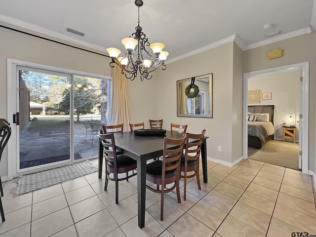 dining space with light tile patterned floors, baseboards, a notable chandelier, and crown molding