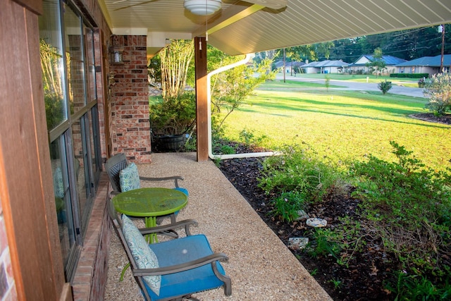 view of yard featuring ceiling fan