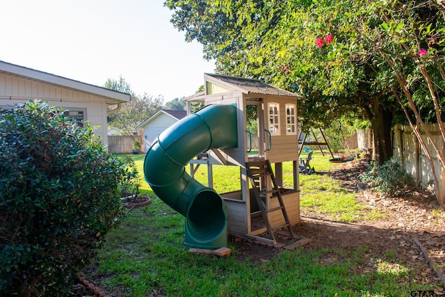 view of playground featuring a yard