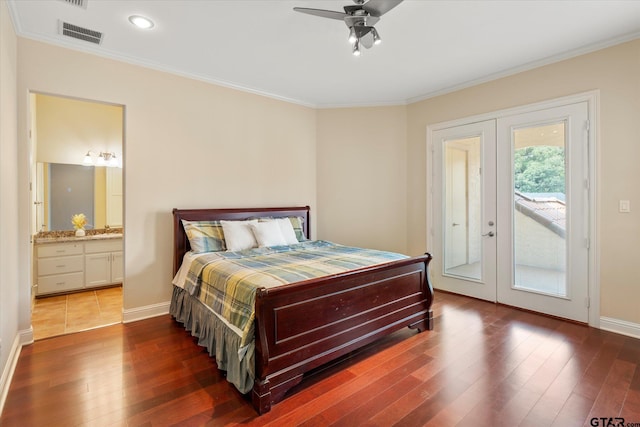 bedroom featuring access to outside, french doors, dark hardwood / wood-style floors, ceiling fan, and ensuite bathroom