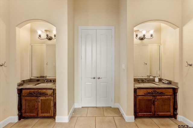 bathroom with vanity and tile patterned flooring