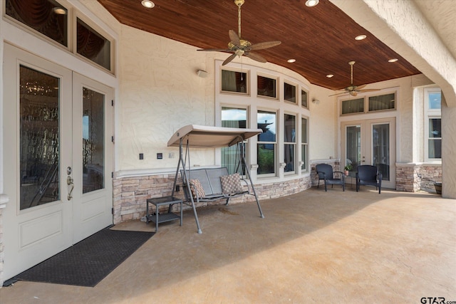 view of patio / terrace with french doors and ceiling fan