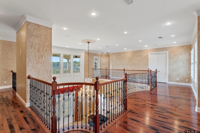 interior space featuring ornamental molding and dark hardwood / wood-style floors