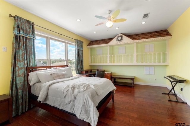 bedroom with ceiling fan and dark hardwood / wood-style floors