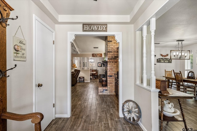 113 Granada Sq, Canton, TX 75103 - corridor featuring dark wood-style floors, baseboards, and a chandelier